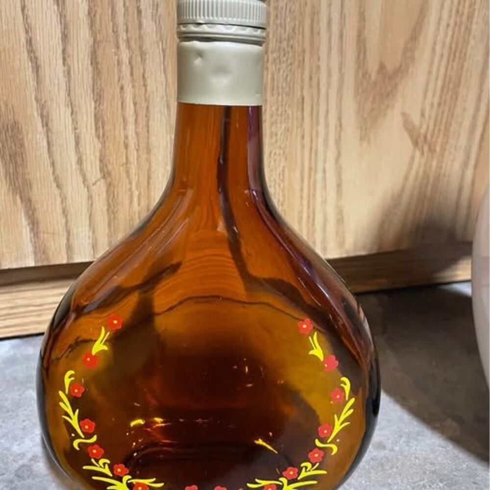 Cute decorative bottle with flowers